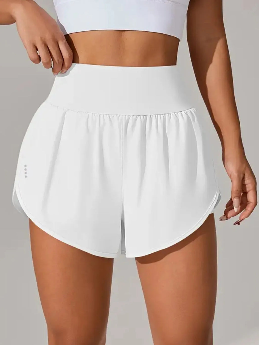 women's pocketed high waist active shorts - lifestyle shot