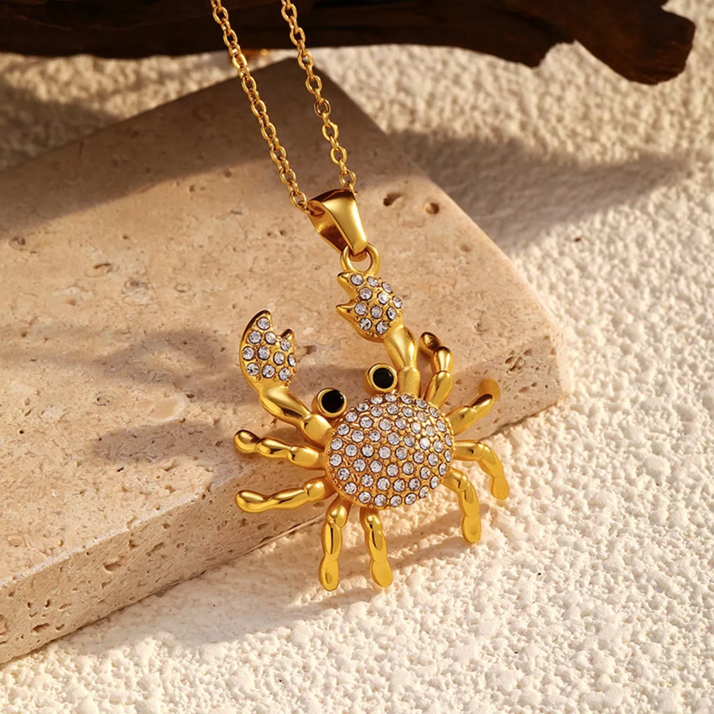 women's 18k gold-plated crab pendant necklace - styled view