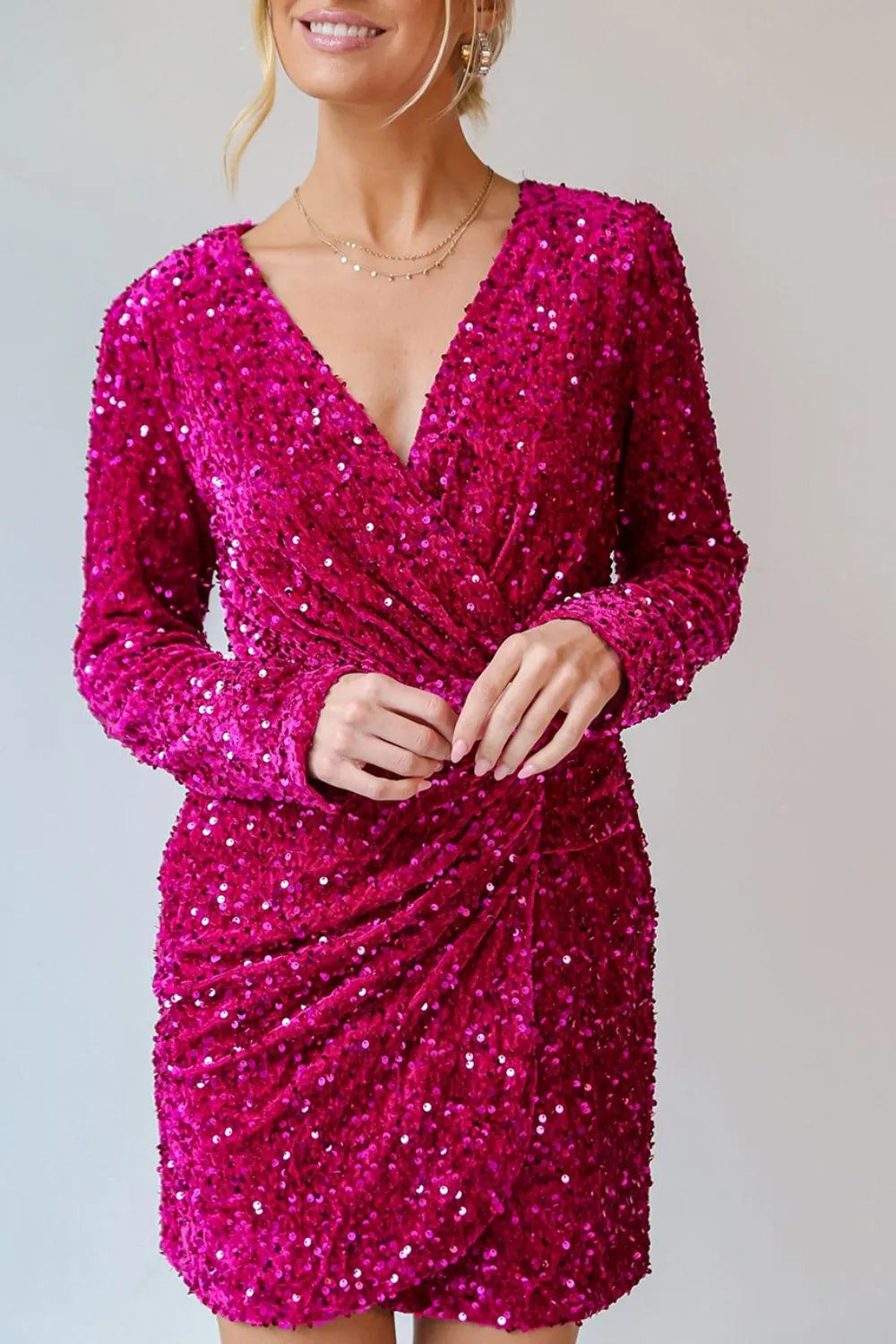 sequin surplice long sleeve mini dress shown as women’s dress