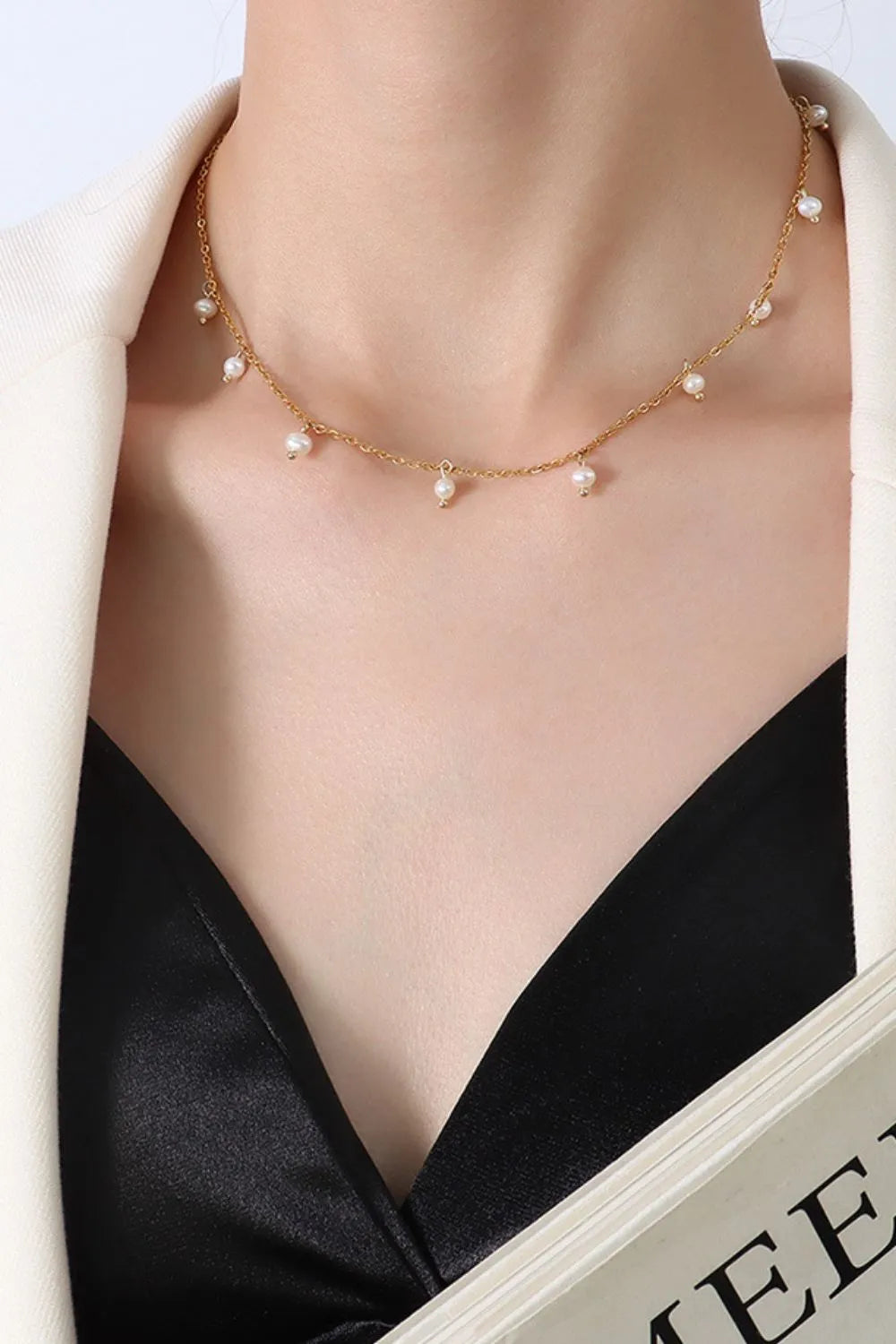 18k gold-plated titanium steel pearl necklace styled as a women’s activewear