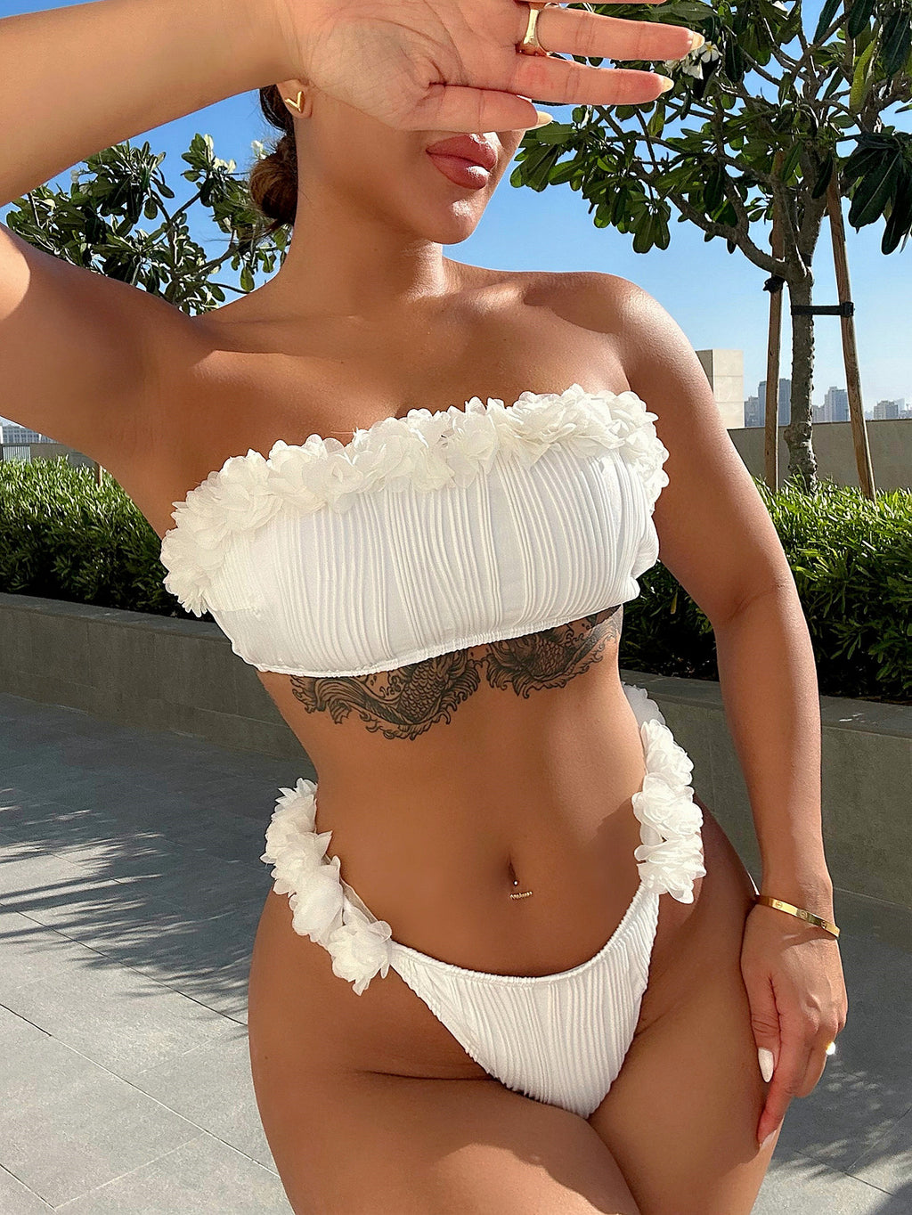 applique tie back two-piece bikini set shown as women’s swimsuit