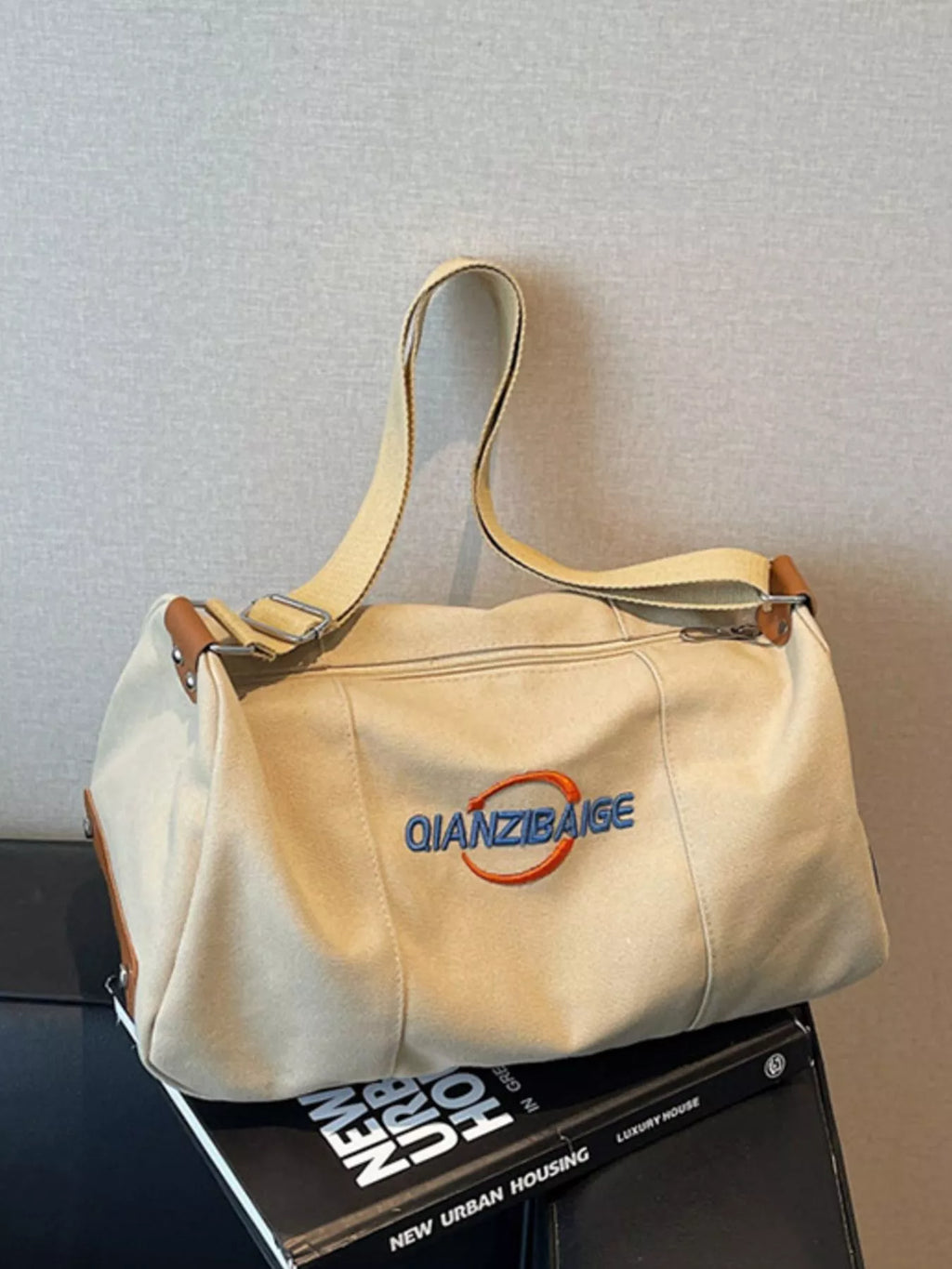 women's canvas duffel bag with adjustable shoulder strap - product showcase
