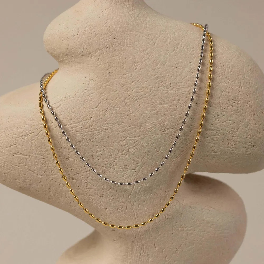titanium steel beaded necklace styled as a women’s activewear