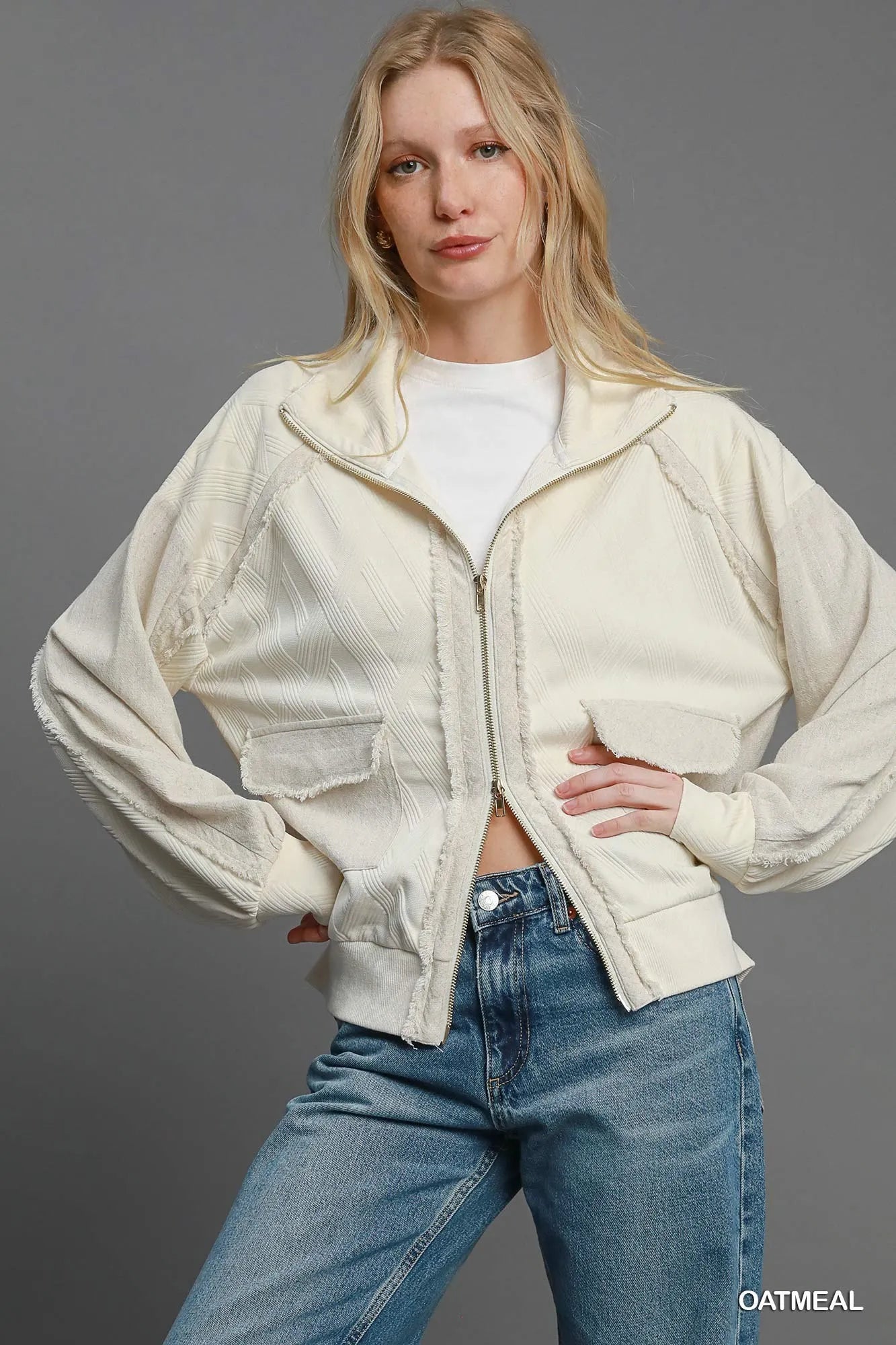 faux fur-trimmed outerwear jacket in city snow