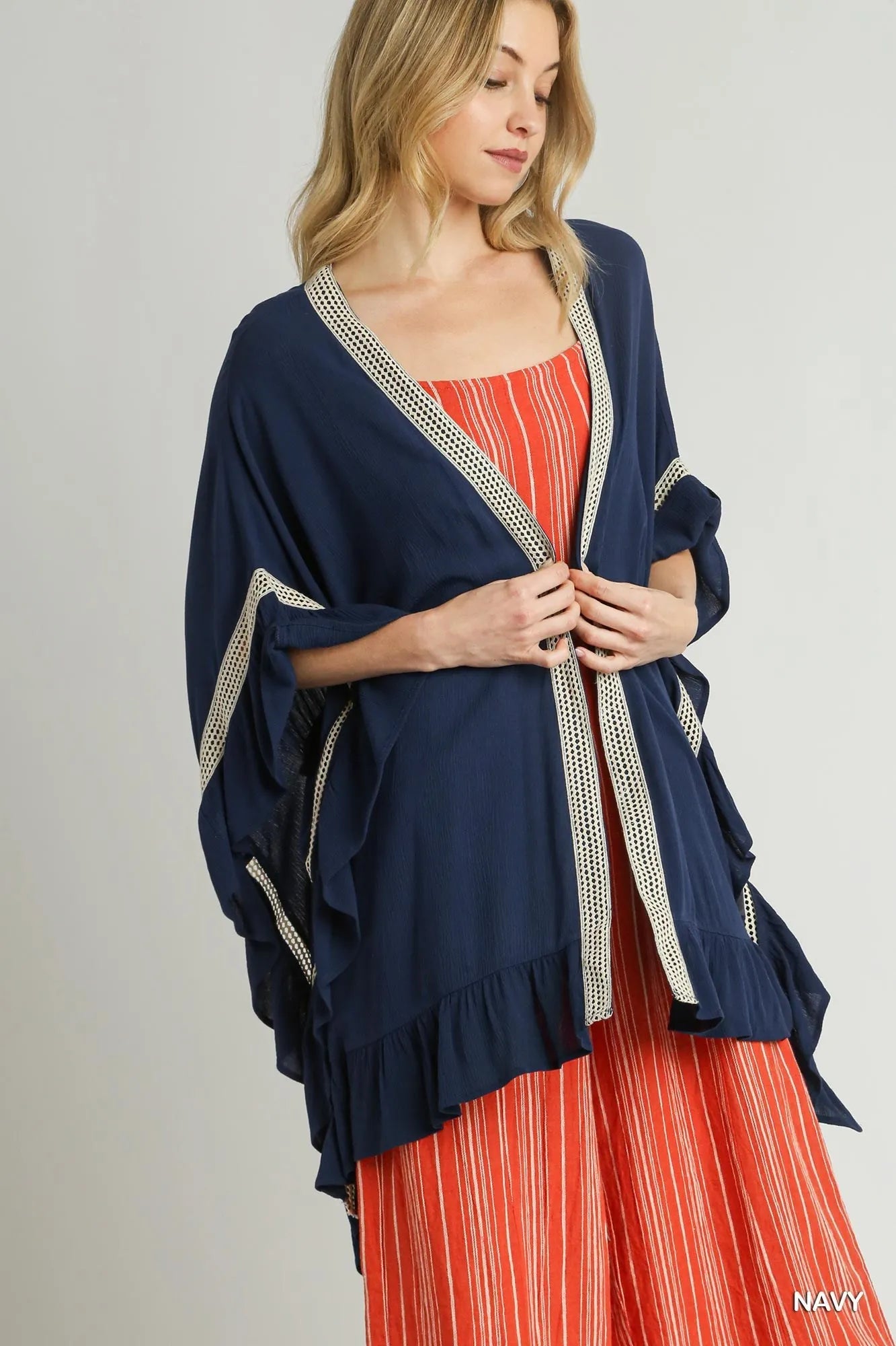hooded outerwear jacket in city snow