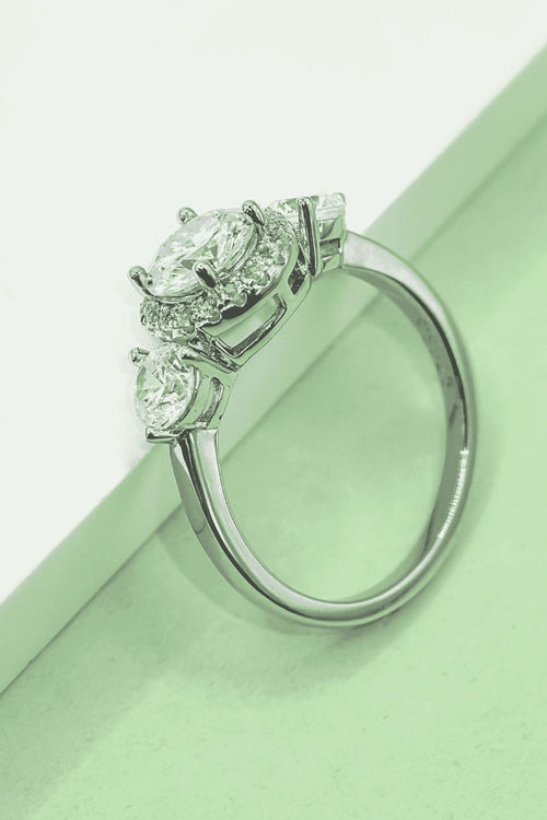 old mine cut oval vintage diamond engagement rings 1 Carat Moissanite 925 Sterling 40% Off in Silver, size 5, 6, 7, 8, 9, 10, shown in angled view highlighting gemstone detail