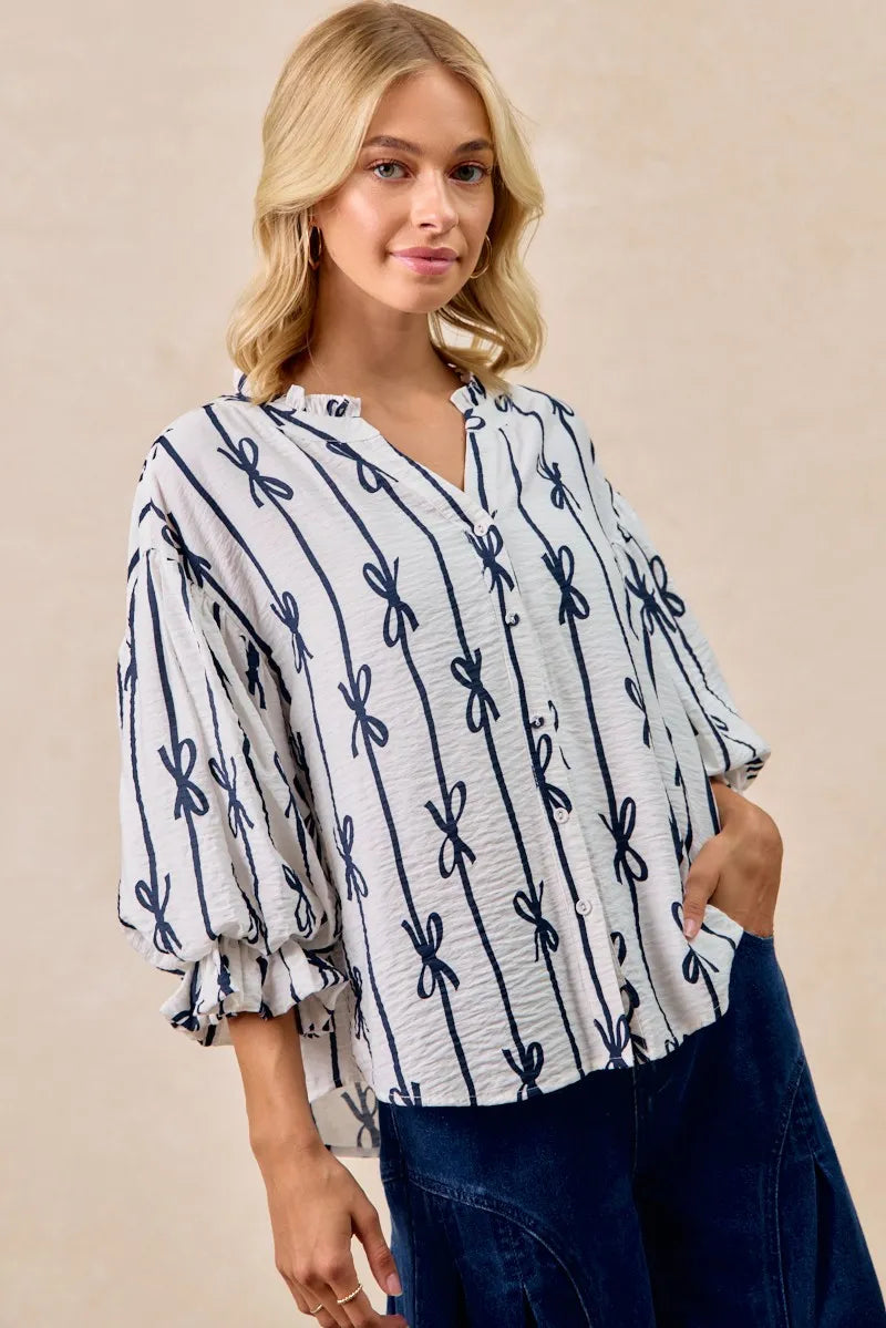 bibi bow ribbon printed woven bubble sleeves top shown as women’s outerwear
