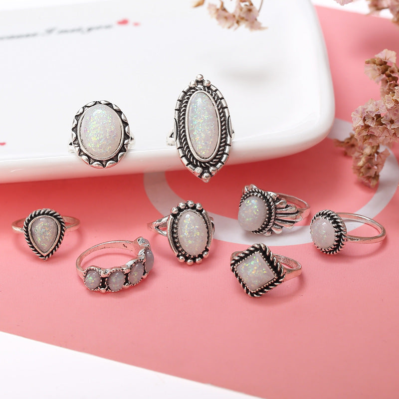 old european cut moissanite stackable fashion rings The Eclipse Set – 8-Piece Opal & Alloy Geometric Rings in Silver, size One Size, shown in top view highlighting gemstone detail