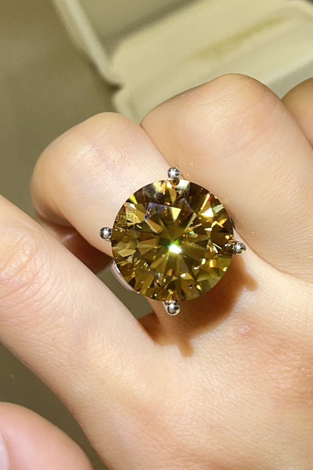 gold wedding bands for couples antique jewelry silver 20 Carat Moissanite 925 Sterling Silver Ring in Gold, size 4, 5, 6, 7, 8, 9, shown in angled view highlighting gemstone detail