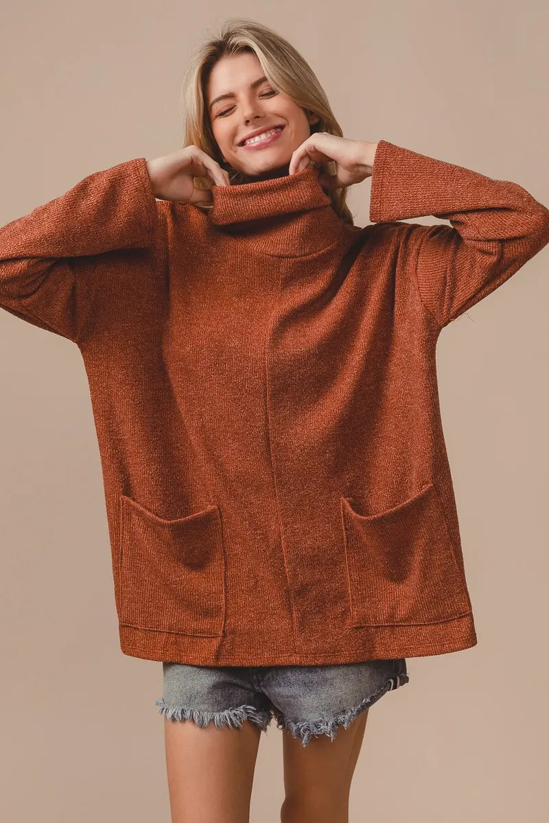 bibi piper rib double pocket turtle neck sweater shown as women’s sweater