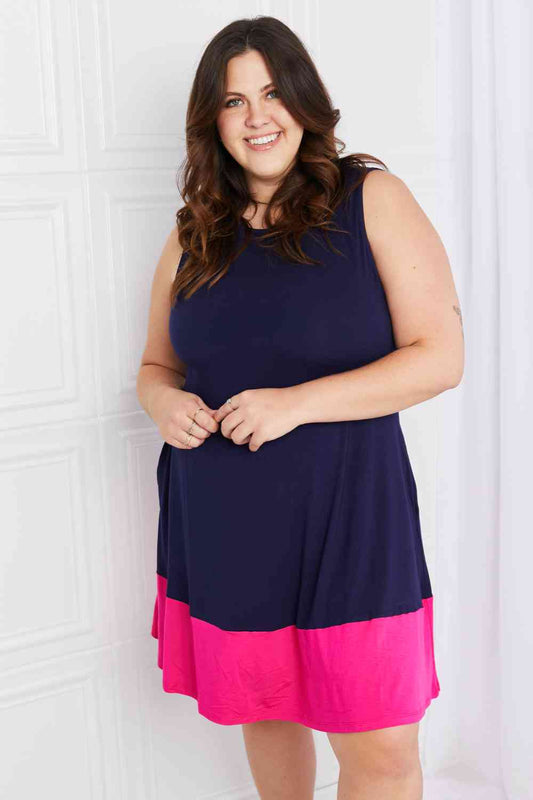 Yelete Full Size Two-Tone Sleeveless Mini Dress with Pockets Navy/Fuchsia