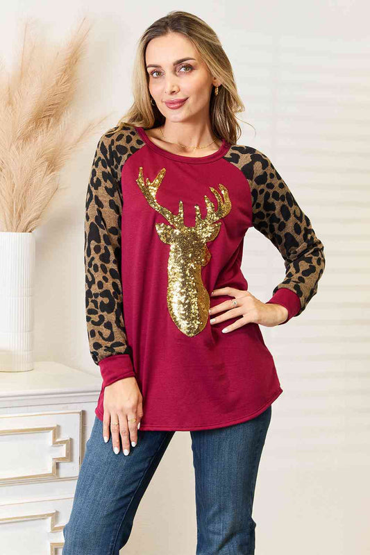 Heimish Full Size Animal Print Reindeer Top Wine