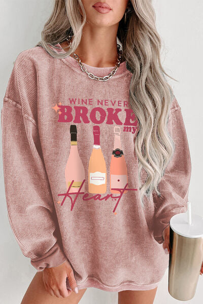 WINE NEVER BROKE MY HEART Round Neck Sweatshirt Blush Pink