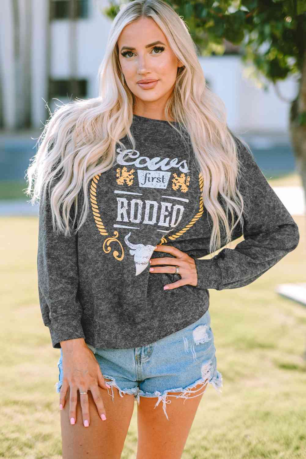 Mineral Washed COW'S FIRST RODEO Round Neck Raglan Sleeve Sweatshirt Charcoal