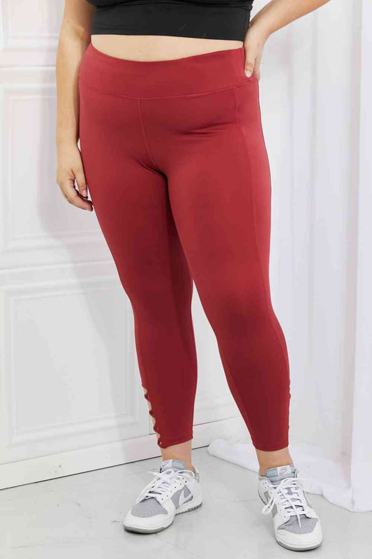 Yelete Ready For Action Full Size Ankle Cutout Active Leggings in Brick Red Brick Red